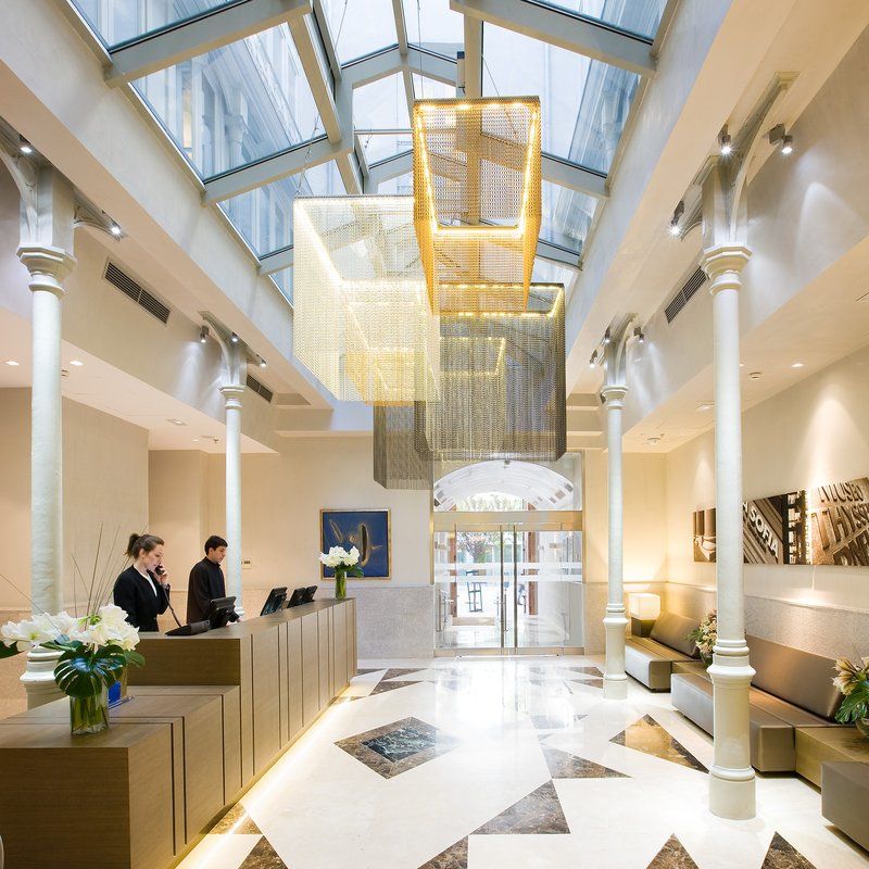 Nh Collection Madrid Palacio De Tepa Εξωτερικό φωτογραφία The lobby of the hotel